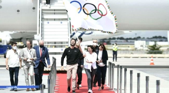 العلم الأولمبي يرفرف في باريس بعد 100 عام من الغياب 