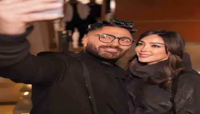 المطرب تامر حسني والفنانة بسمة بوسيل يحتفلان بتخرّج نجلهما آدم