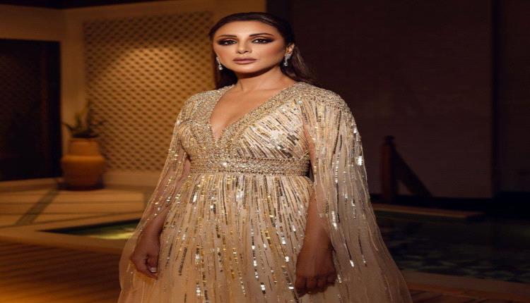 النجمة أنغام تتألق كالأميرة بفستان متلألئ