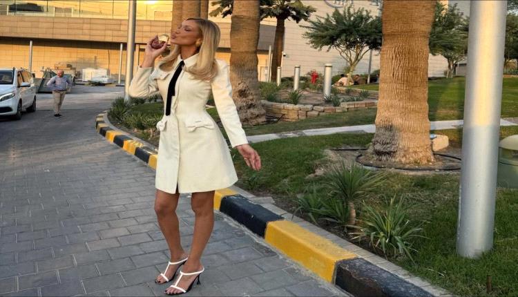 نجمة الموضة بيلا حديد تجمع بين الكلاسيكية والرسالة الإنسانية بفستانها القديم في الكويت