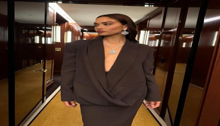 أسلوب إيرينا شايك يلهب الموضة: السترات المفتوحة عنوان الجرأة في 2025!