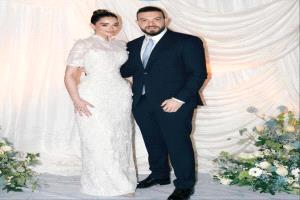 ملك أحمد زاهر تلفت الأنظار بفستان خطوبة فخم وبتطريزات دقيقة