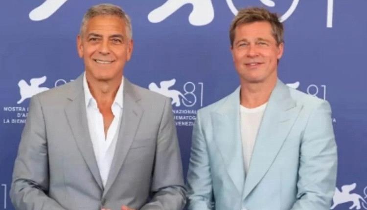 براد بيت يختار طريقة غير تقليدية وطريفة لتهنئة جورج كلوني في مهرجان البندقية السينمائي