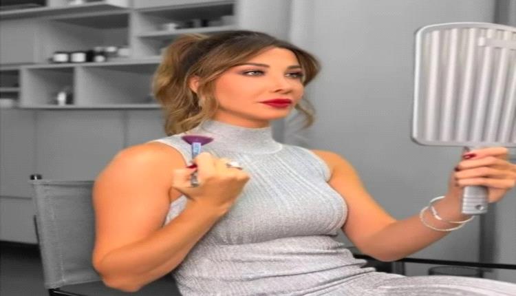 نانسي عجرم تحدث ضجة كبيرة بفستان فضي وقبلة على خد زوجها